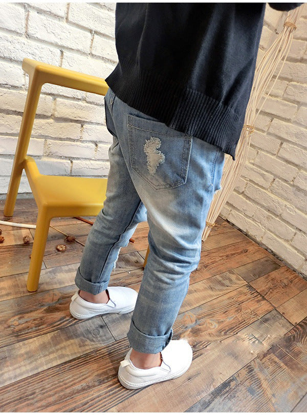 Nouveaux pantalons déchirés pour garçons