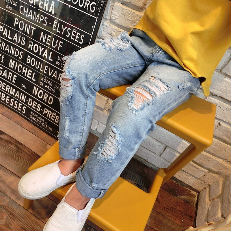 Nouveaux pantalons déchirés pour garçons